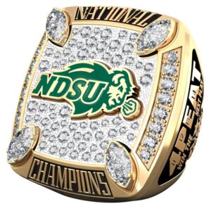 NDSU championship ring with diamonds and engraved details.