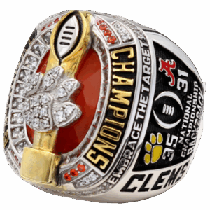 A Clemson Tigers championship ring with detailed engravings.
