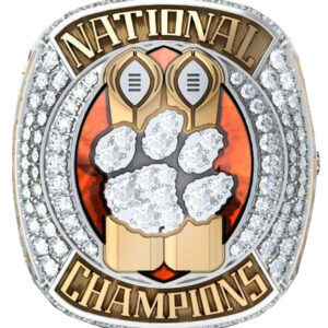 A detailed National Champions ring with a paw print and footballs.