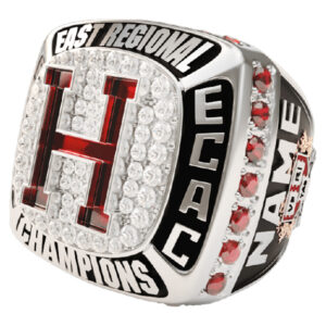 A diamond-studded championship ring with a large 'H' and 'East Regional Champions' inscription.