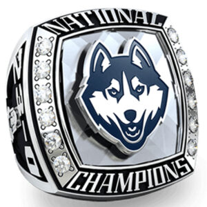 A silver championship ring featuring a husky mascot and the words 'National Champions'.
