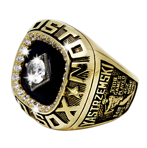 A Houston Astros championship ring with diamonds and engraved details.
