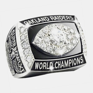 Oakland Raiders' World Champions ring with diamonds and engraved details.