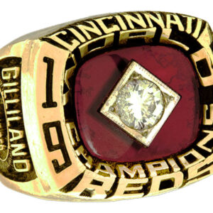 Close-up of a Cincinnati 1990 championship ring with a diamond centerpiece.