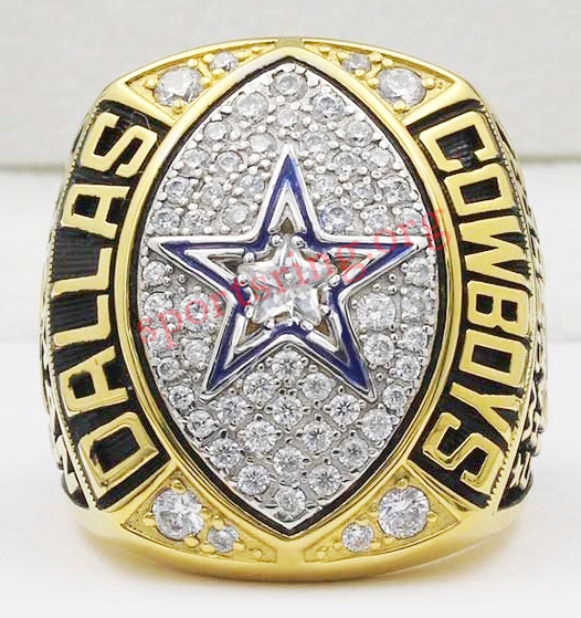 Dallas Cowboys championship ring with star emblem and diamonds.
